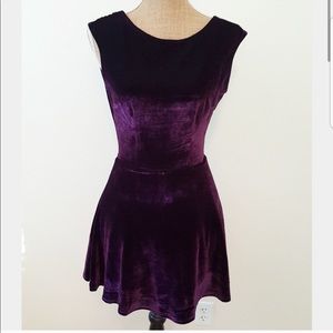 Tobi plum velvet open back skater dress.